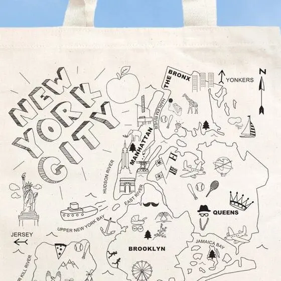 Custom New York City map artwork drawn across a natural canvas tote