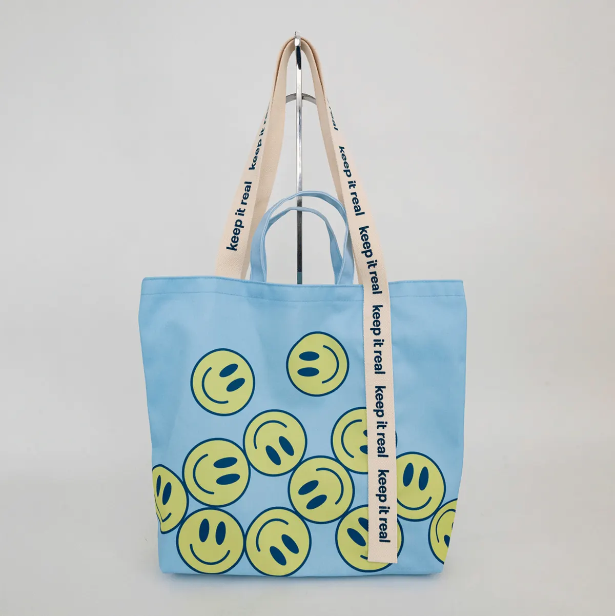 Custom tote bag sample considered for an early-stage swag drop
